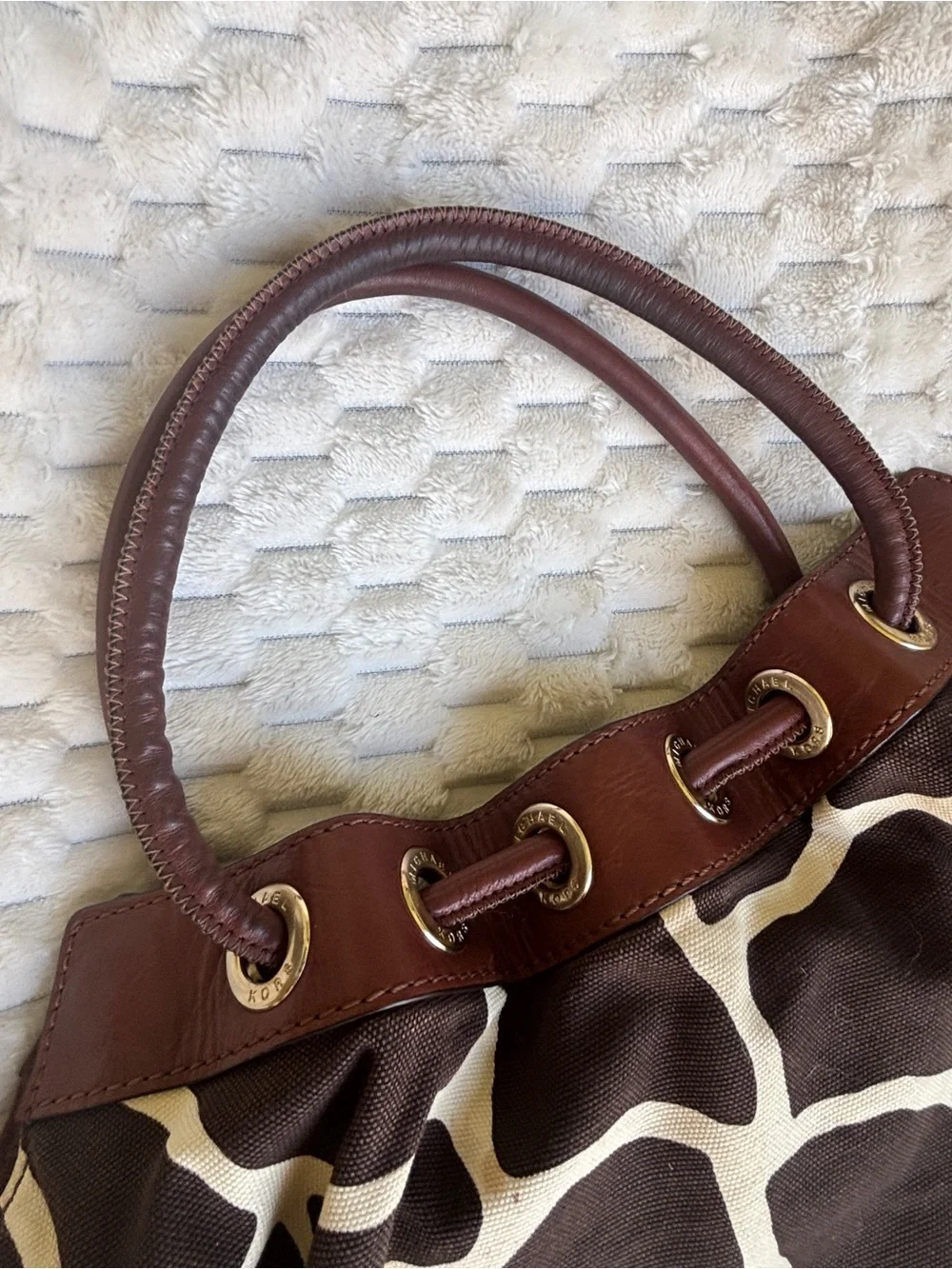 Michael Kors giraffe print canvas, leather trim designer, Gromit detail